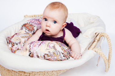 Infant drinking mother's milk, in the foreground sweet baby arm clipart