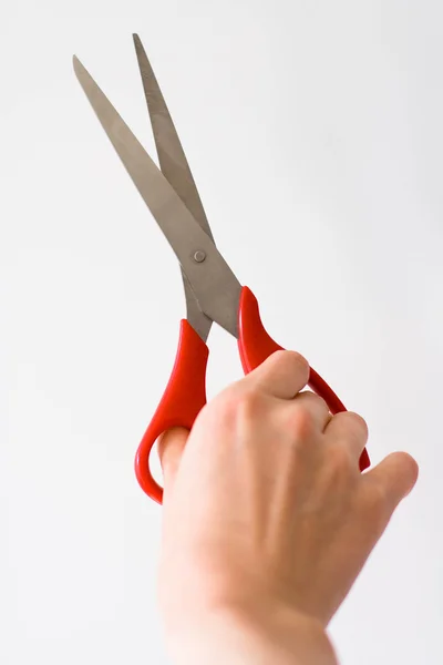 Stock image Hand and scissors