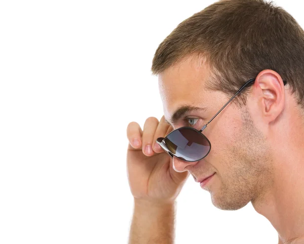 Portrait of young guy with sunglasses in profile — Stock Photo, Image