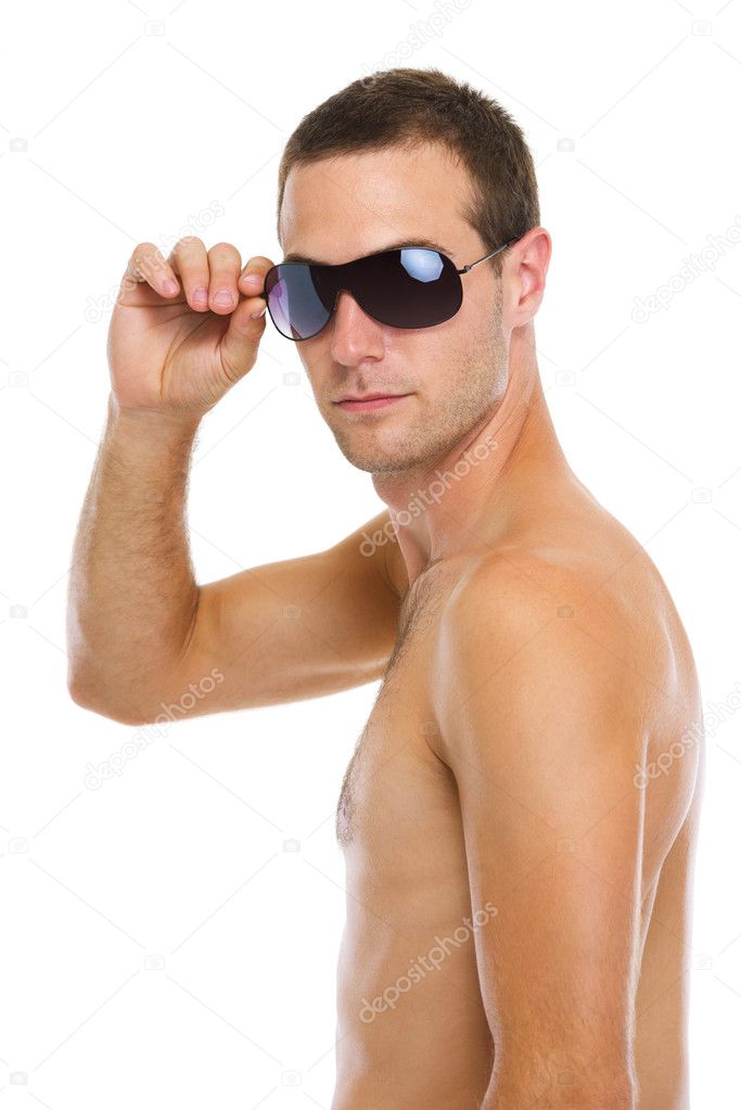 Portrait of young guy in sunglasses