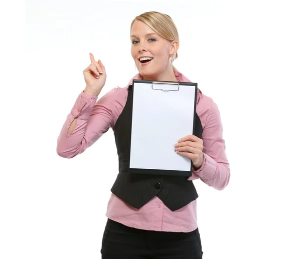 Woman employee showing blank clipboard — Stock Photo, Image