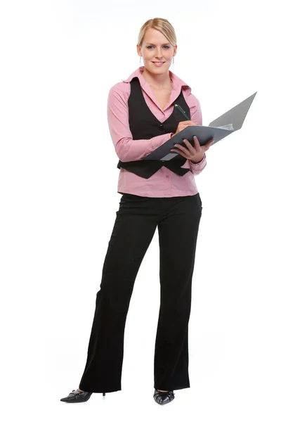 Full length portrait of employee woman writing in folder — Stock Photo, Image