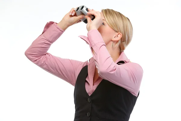 Woman looking through binoculars up. Side view — Stock Photo, Image
