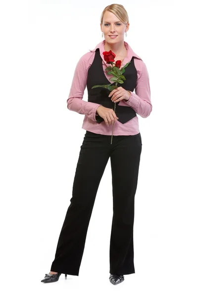 Full längd porträtt av kvinna med ros — Stockfoto