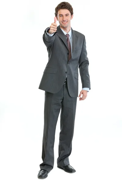 Полный портрет бизнесмена, показывающего большие пальцы вверх — стоковое фото