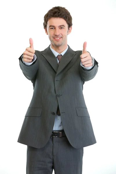 Homem de negócios moderno mostrando polegares para cima — Fotografia de Stock