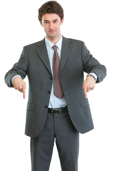 Modern businessman pointing down — Stock Photo, Image
