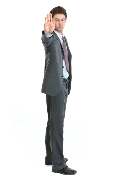 Full length portrait of businessman showing stop gesture — Stock Photo, Image