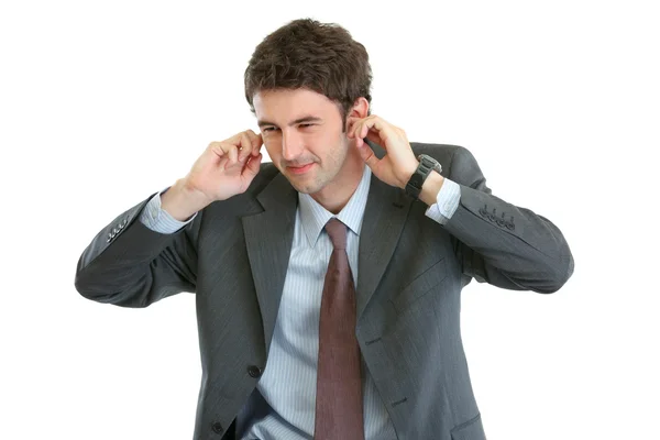 Portret przestraszony biznesmen zamknięcie uszu palcami — Zdjęcie stockowe