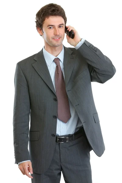 Homem de negócios moderno falando móvel — Fotografia de Stock