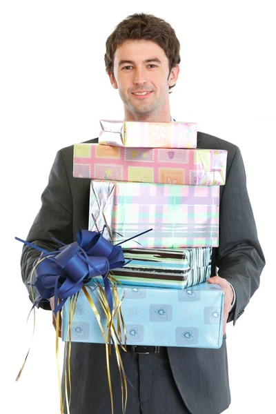 Man holding stack of gift boxes — Stock Photo, Image