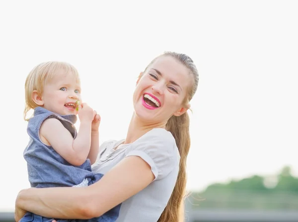 Portrait of happy mother with baby — Stock Photo, Image