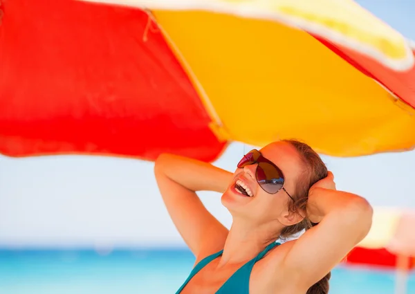 stock image Happy woman enjoying vacation on beach