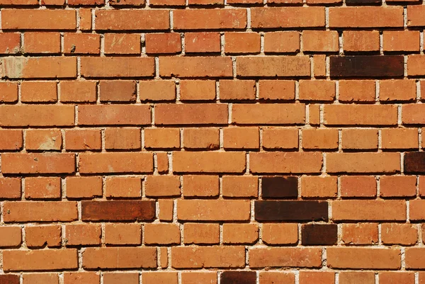 Стена дома из красного кирпича — стоковое фото