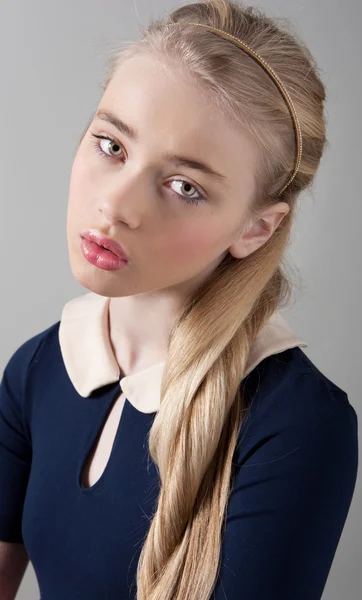 Portrait of a beautiful teenager girl with fair skin in studio — Stock Photo, Image