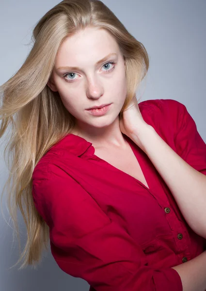 Young woman in red shirt — Stock Photo, Image