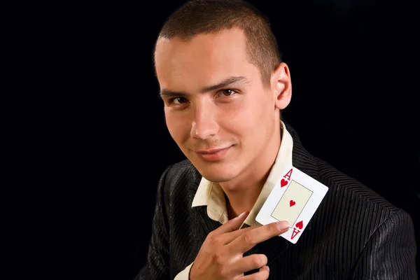 Mladý hráč štěstí s kartami — Stock fotografie