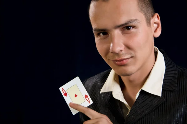 Şanslı genç kumarbaz kartları ile — Stok fotoğraf