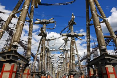 Electric substation in a bright sunny day clipart