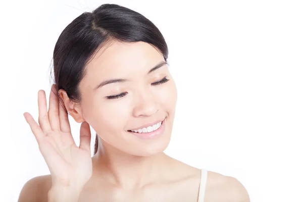 Žena poslouchat uchem — Stock fotografie