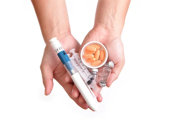 Medication and syringe needle with Hand — Stock Photo, Image