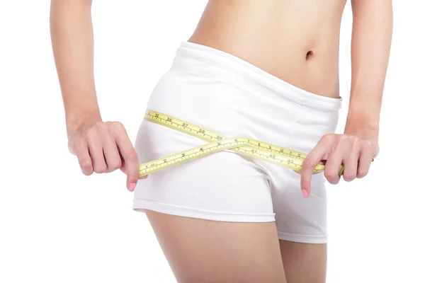 Close up Woman measuring shape of hips — Stock Photo, Image