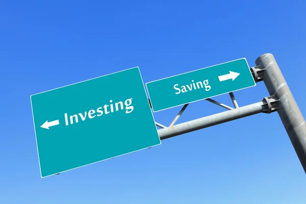 Saving or investing money in road sign — Stock Photo, Image