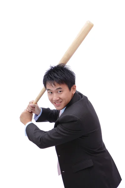 Бизнесмен берет бейсбольную биту с дружелюбной улыбкой — стоковое фото