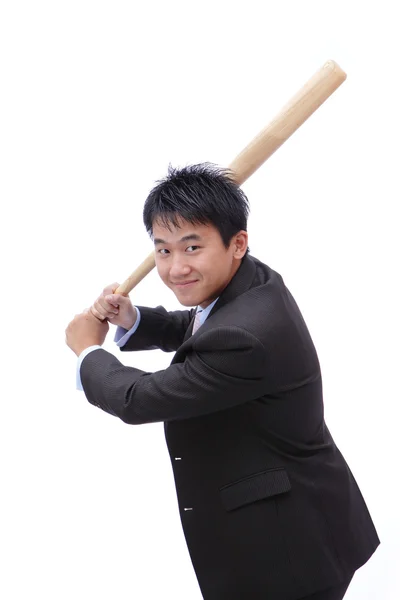 Obchodní muž vzít baseballovou pálkou — Stock fotografie