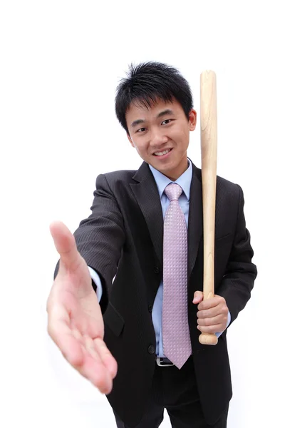 Business man handdruk en honkbalknuppel te houden — Stockfoto