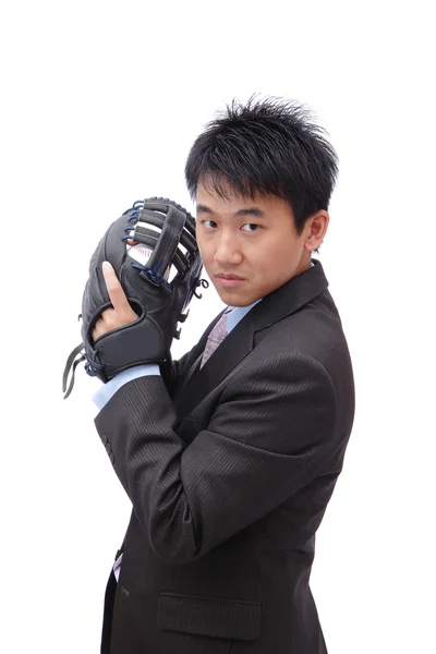 Jovem homem de negócios lançando beisebol — Fotografia de Stock