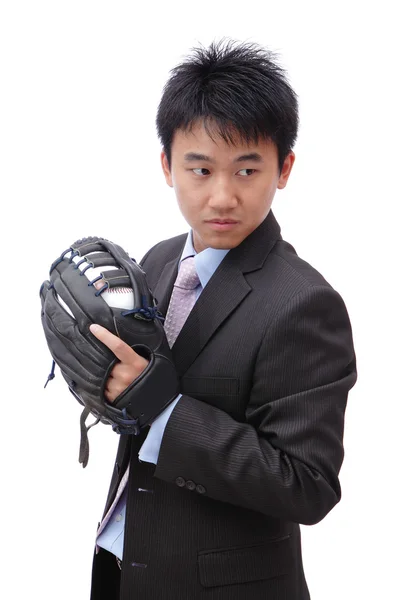 Jovem homem de negócios lançando beisebol — Fotografia de Stock