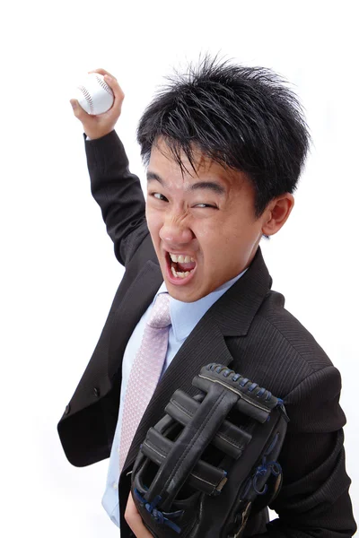 Business man pitching baseball with all his strength — Stock Photo, Image
