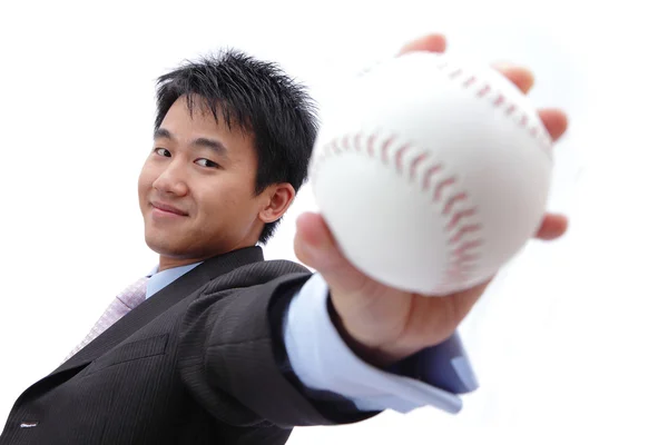 Geschäftsmann nimmt Baseball — Stockfoto