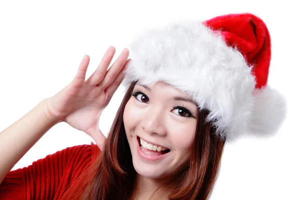 Fröhliches Mädchen grüßt mit Weihnachtsmütze — Stockfoto