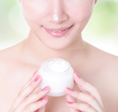 Woman smile with moisturizer cream clipart