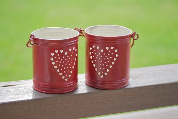 Small red bucket for candle — Stock Photo, Image
