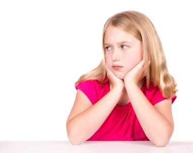 Angry or upset child looking to the side clipart