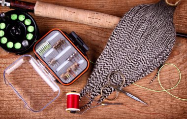 Collection of fly tying and fishing equiptment clipart
