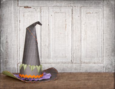 Witches hat with grunge background clipart