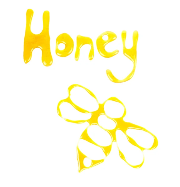Ordet honung och bild av ett bi gjorda av honung — Stockfoto