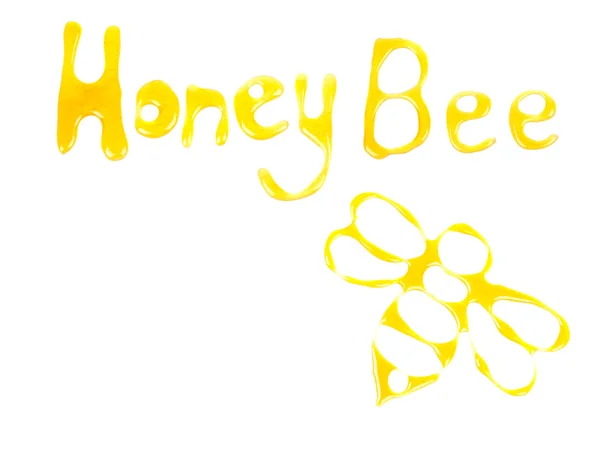 Words Honey bee and bee drawn with honey — Stock Photo, Image