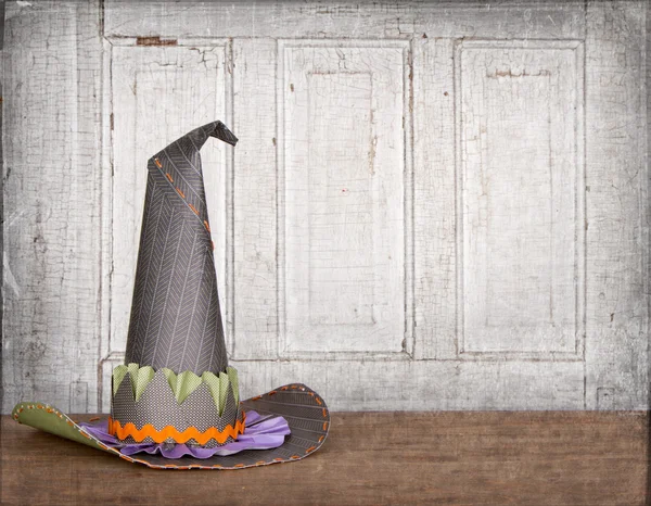 Witches hat with grunge background — Stock Photo, Image