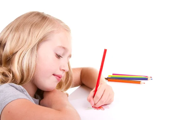 Літня дівчина або підліток малює квітку — стокове фото