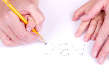 Mother helping daughter write alphabet clipart