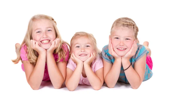 Drie zusters glimlachen — Stockfoto