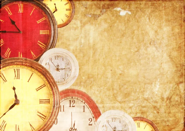 Many clocks on a paper background — Stock Photo, Image