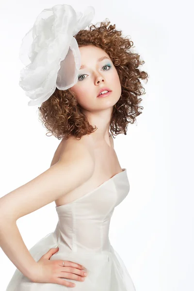 Pretty young female with curly hair and bow portrait — Stock Photo, Image
