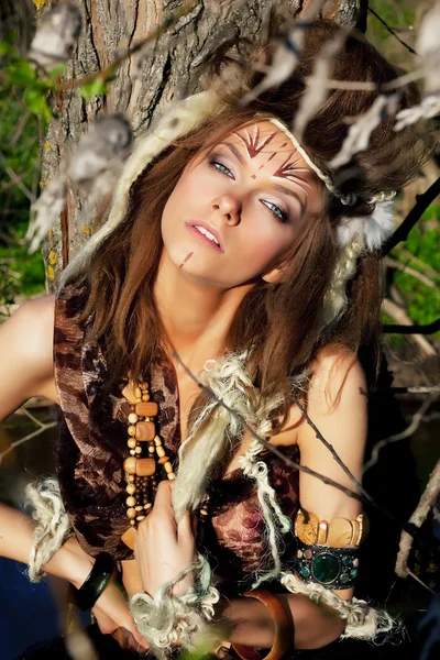 Sexy tribal female with tottoo on her face — Stock Photo, Image