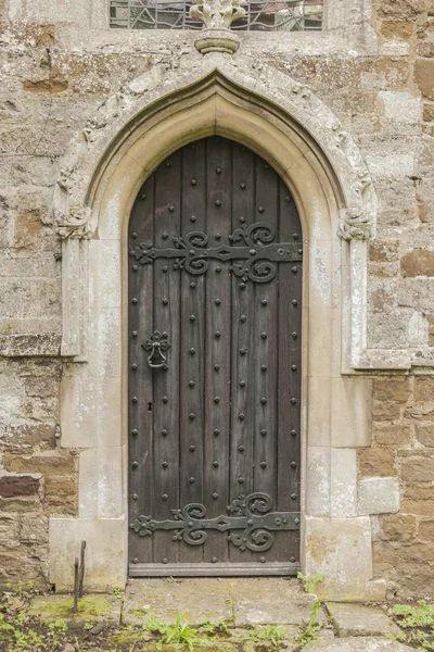 Staré dveře kostela — Stock fotografie